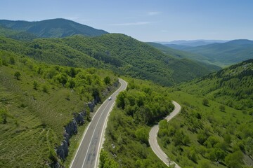 Fototapeta premium Winding road - Lovcensky serpentine with dangerous turns that leads to the top of the Montenegrin mountains covered with vegetation. Beautiful simple AI generated image in 4K, unique.