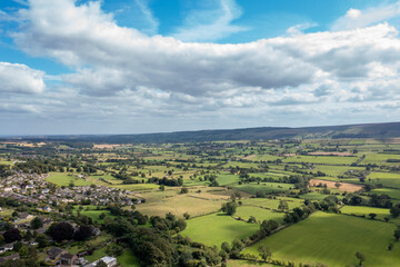 Fototapeta premium Aerial drone photo of the beautiful town of Leyburn which is a market town and civil parish in North Yorkshire in the UK, showing the houses in the town from above in the summer time