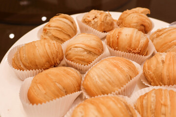 close up of Chinese fried Puff Pastries Filled with Shredded Turnip, baked deep fried turnip radish cake