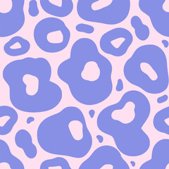 Abstract animal seamless pattern with irregular hand drawn blue shapes on a pink background. Vector simple spotted design for textile, wallpaper, wrapping paper, cover, poster, invitation 
