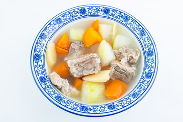 A bowl of carrot, winter melon and pork ribs soup