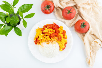A dish of home-cooked tomato scrambled eggs with rice