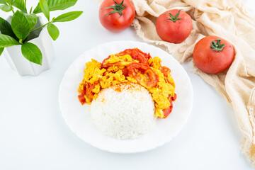 A dish of home-cooked tomato scrambled eggs with rice