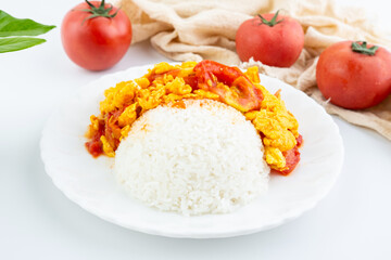 A dish of home-cooked tomato scrambled eggs with rice