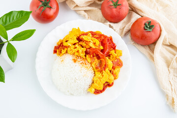 A dish of home-cooked tomato scrambled eggs with rice