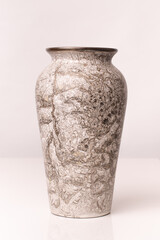 Antique-style vase made of stone, featuring detailed craftsmanship