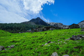 The landscape of the Alpe Lendine and the Val chiavenna, a valley of the Italian alps, near the town of Chiavenna, Italy - June 2024