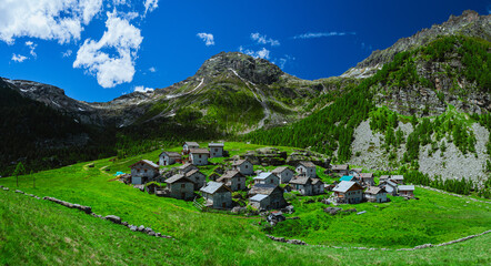 The Alpe Ledine with its typical houses and high mountain pastures, near the town of Chiavenna, Lombardy - June 15, 2024 © Roberto