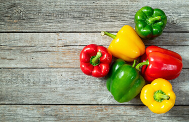 Fresh sweet bell pepper ( paprika ) photography red , green and yellow . Colorful vegetable . Top view