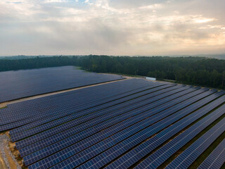 Morning Drone Images of a Large Renewable Solar Farm in Louisburg North Carolina Using Technology and Science for Green Energy & Lowering Carbon Footprints. 