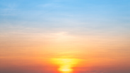 Fototapeta premium Beautiful , luxury soft gradient orange gold clouds and sunlight on the blue sky perfect for the background, take in everning,Twilight, Large size, high definition landscape photo