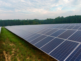 Morning Drone Images of a Large Renewable Solar Farm in Louisburg North Carolina Using Technology and Science for Green Energy & Lowering Carbon Footprints. 