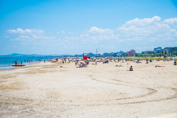A view along the beach at Rimini, Italy in summertime