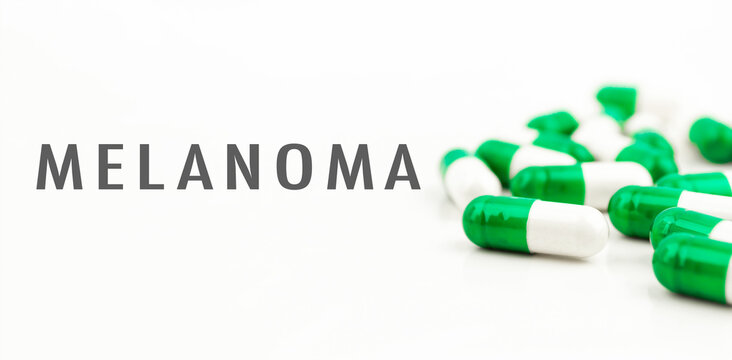 A bunch of pills with the word Melanoma written on them