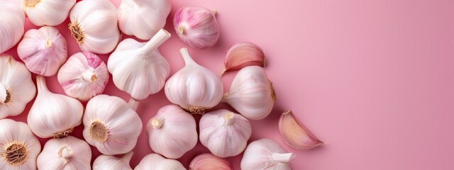  Three piles of garlic on pink backgrounds