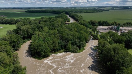 Flood waters on Genesee River after rain event storm in New York State countryside 