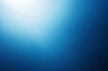 Obraz premium A stunning shot of a bright blue ocean with a sunbeam shining through the water.
