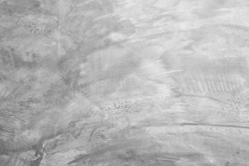 concrete wall with a raw, unfinished look showcases the rough texture of the material. The minimalist design highlights the industrial feel, with visible seams and natural imperfections 