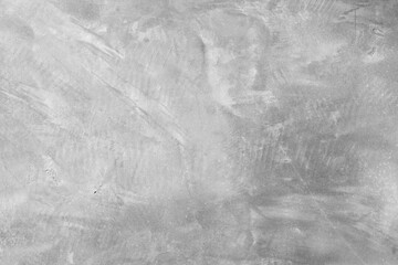 concrete wall with a raw, unfinished look showcases the rough texture of the material. The minimalist design highlights the industrial feel, with visible seams and natural imperfections 