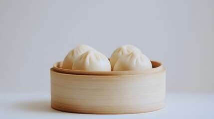 Realistic photograph of four steamed buns in a wooden basket against a solid stark white background with focused lighting, dumplings