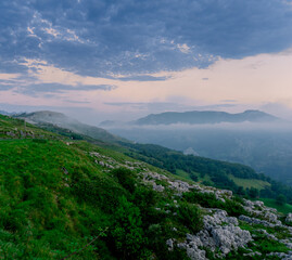 green mountain landscape with clouds