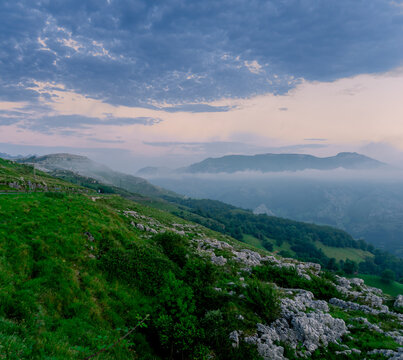 green mountain landscape with clouds