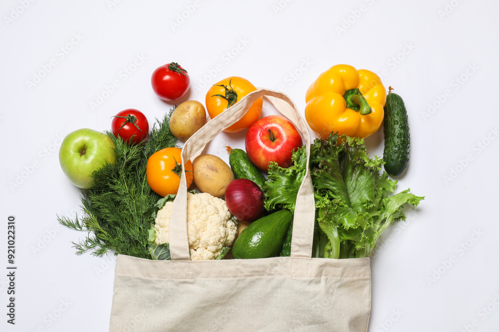 Poster Delivery of vegetarian products. Bag with different vegetables and fruits on white background, top view