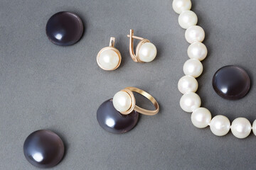 Elegant jewelry set with gemstone. Product still life. Ring, necklace, earrings.