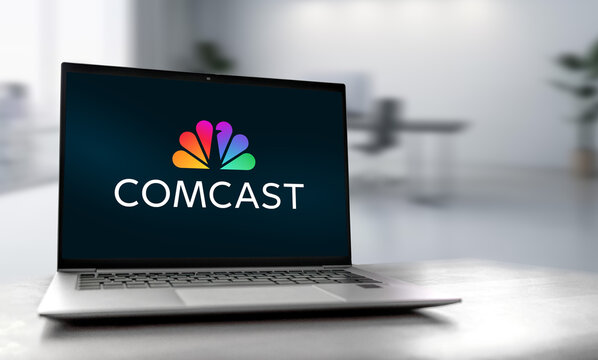 Comcast logo displayed on laptop