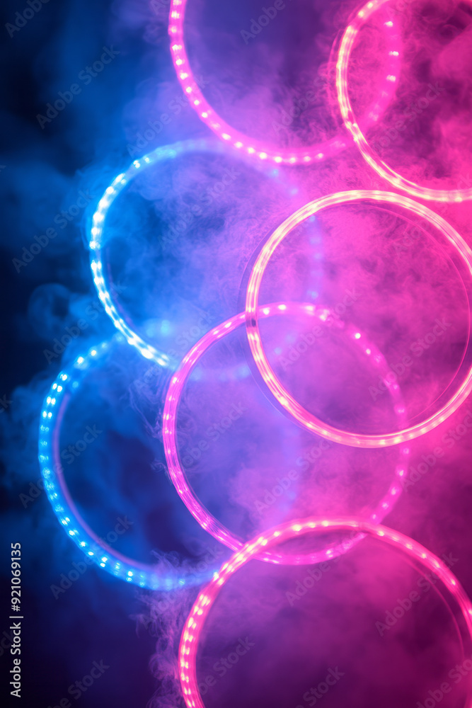 Poster abstract neon circles in cyan and magenta, arranged in a grid pattern that shifts and pulses with li