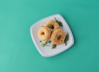 Vada, vadai, wada, bara, or bora is a category of savoury fried snacks native to India. Vadas can be described variously as fritters, cutlets, or dumplings. Vadas are sometimes stuffed with vegetables