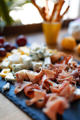 Chalkboard beer appetizers, cheese and meat
