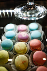 colorful candy in the store window. Sweet macaroons 