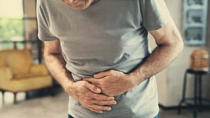 Senior man with stomach pain	