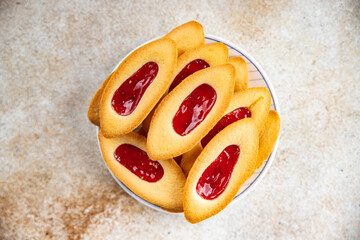 Cookies strawberry jam boat shape sweet christmas cookies delicious baked goods Christmas background New Year's holiday fresh meal food snack on the table copy space food background rustic top view