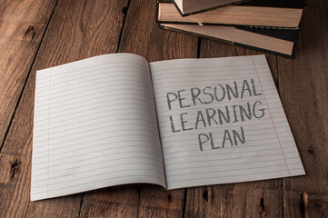 A notebook with the words personal learning plan written on it