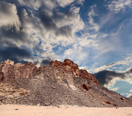 Mountains of Wadi Rum Desert also known as The Valley of the Moon is a valley cut into the sandstone and granite rock in southern Jordan 60 km to the east of Aqaba