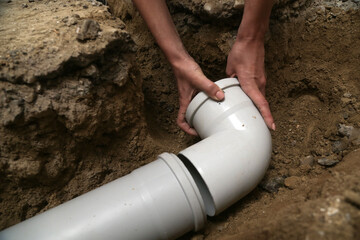 Obraz premium Process of installing PVC pipes sewage system in bathroom, DIY home renovation 