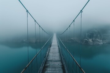Obraz premium A serene bridge shrouded in fog, creating a mysterious and tranquil atmosphere in the landscape, A bridge disappearing into the fog AI generated