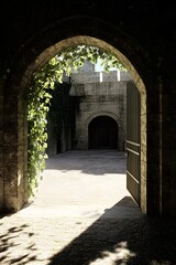 Obraz premium Stone Archway Entrance to Castle Courtyard