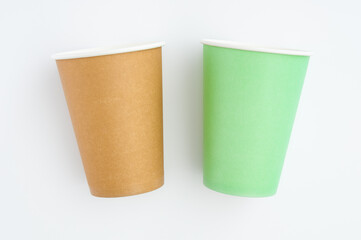 Disposable paper cups close up on a white background