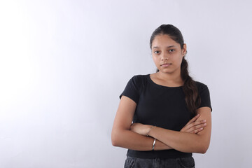 Portrait of middle eastern Israel girl student standing with crossed arms isolated on white background. Smiling young Arabian Indian woman, businesswoman, business lady looking at camera, copy space