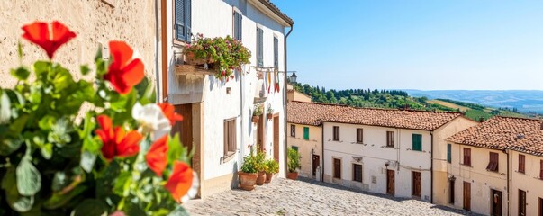 Naklejka premium A traditional Italian village on a hillside, with cobblestone streets and terracotta rooftops