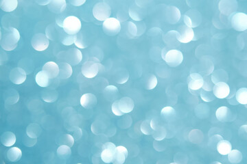 Abstract blue festive christmas background with bokeh.