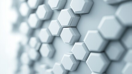 Close-up of a textured hexagonal pattern in soft gray tones, ideal for backgrounds or modern design projects.