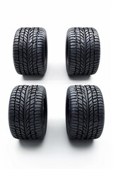 Set of Four Modern Car Tires Displayed Against a Clean White Background for Automotive Design