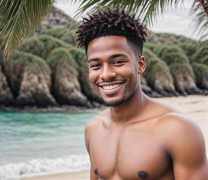A man with a shaved head and a smile on his face is standing on a beach