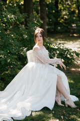 Fototapeta premium young girl bride in spring garden