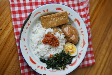rice with egg, chicken and braised tempeh