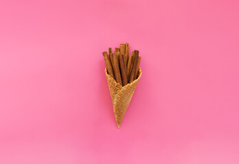 cinnamon sticks in a waffle ice cream cone